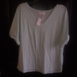 Sky blue short sleeve shirt with a v-neck collar